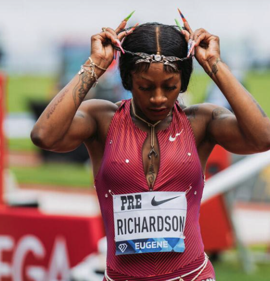 Sha’Carri Richardson puts on a head piece after the conclusion of the Women's 100m. Richardson came in second overall in this event. The Prefontaine Classic was held at Hayward